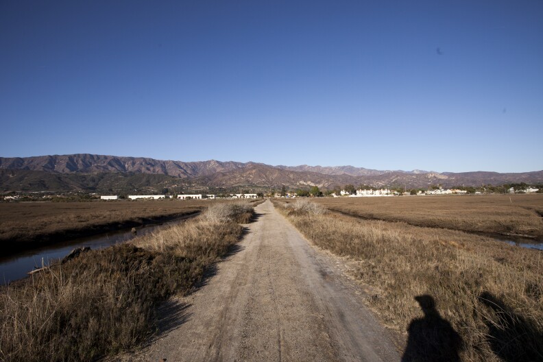 A business park development prevents the Carpinteria salt marsh from moving towards the hills as rising sea levels threaten its survival.