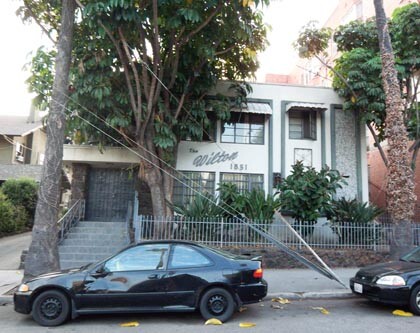 Exterior of a home with a large tree