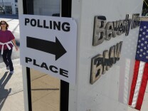 A polling place inside a luxury car dealer in Beverly Hills during the 2010 midterm elections. This year, California voters can skip the paperwork on their way to the ballot box and register completely online.