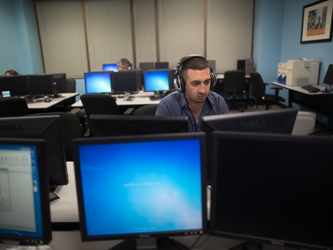Tariq Abu Khumra takes computer programming classes at New Horizons in Burbank three nights a week. He worked in programming in Iraq and aspires to find a job at Google or IBM in the U.S.