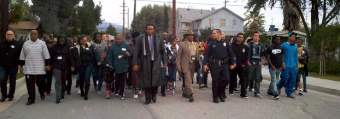 Mourners converged in Redlands on Tuesday, Jan. 11, 2011 to pay their respects to two teenage boys who were were killed in a gang shooting near Oxford Street, north of Colton Avenue. Police said the teens - Quinn McCaleb, 17, and Andrew Jackson, 16 - were shot by a suspected Latino gang member. The mother of one victim believes the incident was racially motivated. Two others were wounded in the attack.
