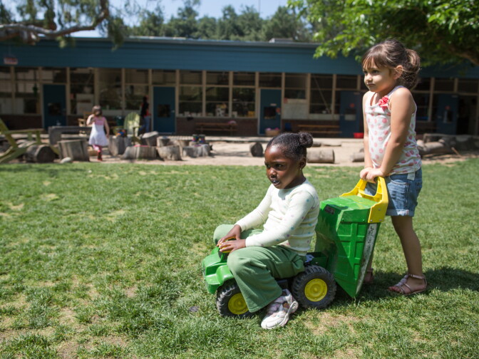 Jordan and Isha play with a truck at the Child Educational Center. Ellen Veselock, the school’s Director of Programming says, “its really important for children to be able to go the direction that they want to go and that means that if this little girl wants to spend her day playing baseball that should be perfectly fine, and she shouldn’t need a pink bat to do that.”