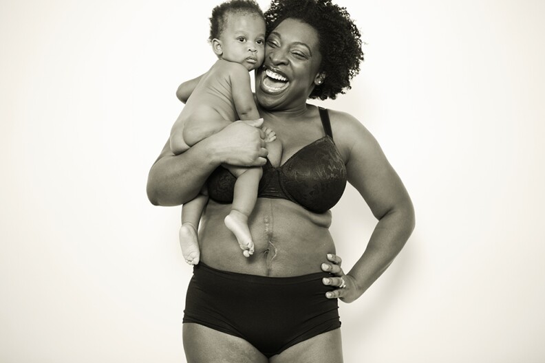 The beautiful Keyonda with her youngest, Nyla (9 months). Keyonda is the mother of 4, Nia (10), AJ (8) and Nadia (3). Keyonda has breastfed all of her children and had all hospital births, although her youngest two were beautifully born in the water. Keyonda’s stomach scar is the result of an operation she had between her first and second children to remove a very large ovarian cyst along with her ovary and fallopian tube. Nyla’s pregnancy was a total surprise. Keyonda had an IUD placed and didn’t even know she was pregnant until she was 26 weeks along!