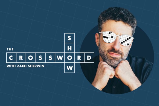 Promotional image for The Crossword Show with Zach Sherwin. A man in a dark shirt and crossword-patterned sunglasses is centered on a dark blue background with the show's title stylized as a crossword puzzle. 