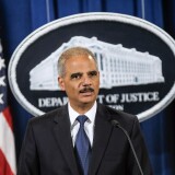 WASHINGTON, DC - SEPTEMBER 30:  U.S. Attorney General Eric Holder speaks during a press conference announcing Department of Justice plans to sue North Carolina over Voter ID regulations at the Department of Justice on September 30, 2013 in Washington, DC. Under the new law North Carolina residents are required to show a photo ID at polling places which some believe threatens the voting rights of minorities.   (Photo by Kris Connor/Getty Images)