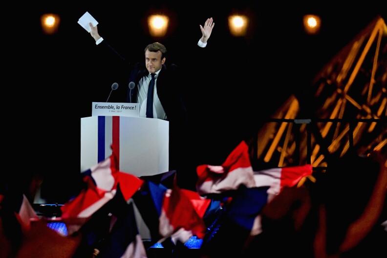 PARIS, FRANCE - MAY 07:  Leader of 'En Marche !' Emmanuel Macron acknowledges supporters after winning the French Presidential Election, at The Louvre on May 7, 2017 in Paris, France. Pro-EU centrist Macron is the next president of France after defeating far right rival Marine Le Pen by a comfortable margin, estimates indicate.  (Photo by Jeff J Mitchell/Getty Images)