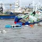 JAPAN OUTFishing boats and vehicles are carried by a tsunami wave at Onahama port in Iwaki city, in Fukushima prefecture, northern Japan on March 11, 2011.