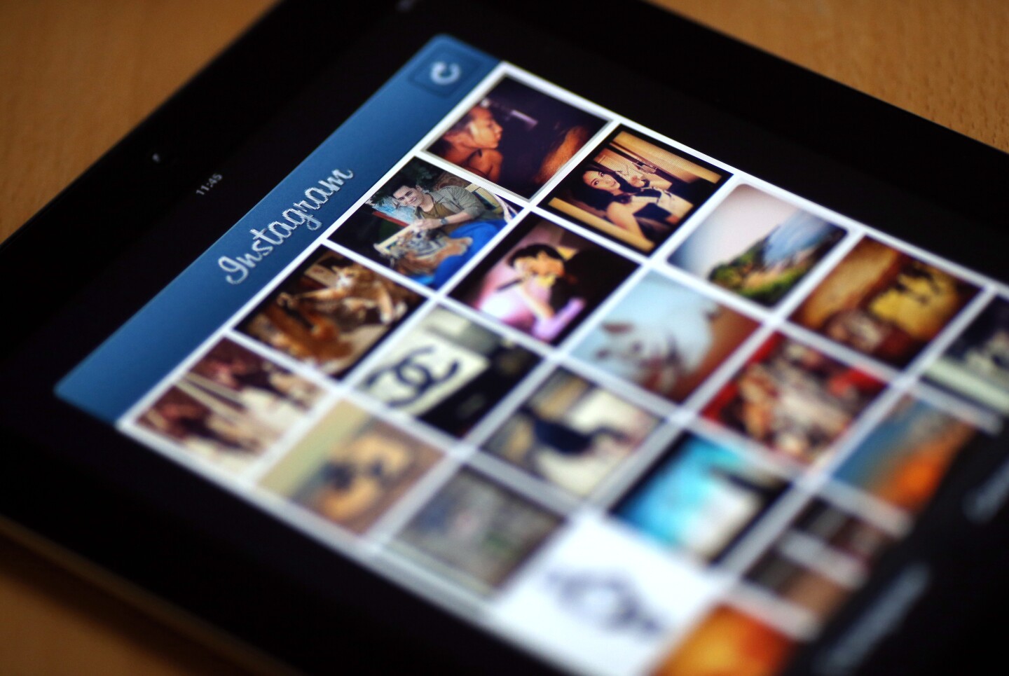 Pictures appear on the smartphone photo sharing application Instagram on April 10, 2012 in Paris, one day after Facebook announced a billion-dollar-deal to buy the startup behind Instagram. The free mini-program lets people give classic looks to square photos using 'filters' and then share them at Twitter, Facebook or other social networks. 