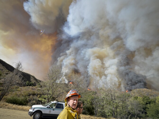 The Sand Fire burns intensely off Placerita Canyon Rd Sunday afternoon. 


The Sand Fire burns in the Angeles National Forest Sunday July 24th, 2016 under a Red Flag Warning high high winds. The fire had burned 22,000 acres by Sunday morning and was 10% contained as firefighters battled low humidity, shifting wind, and high temperatures. An unknown number of structures were lost. 