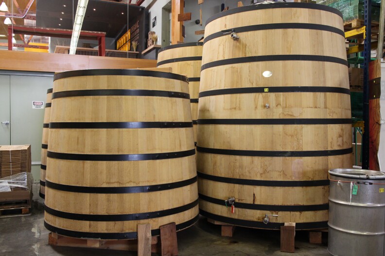 Whiskey aging barrels.