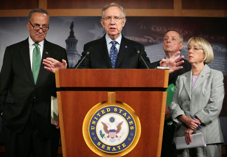 WASHINGTON, DC - JULY 26:  U.S. Senate Majority Leader U.S. Sen. Harry Reid (D-NV) (2nd L) speaks as (L-R) U.S. Sen. Charles Schumer (D-NY), Senate Majority Whip U.S. Sen. Richard Durbin (D-IL), and U.S. Sen. Patty Murray (D-WA) listen during a news conference July 26, 2012 on Capitol Hill in Washington, DC. Senate Democratic leaders called on the House to pick up the Senate-passed middle class tax cut bill.  (Photo by Alex Wong/Getty Images)
