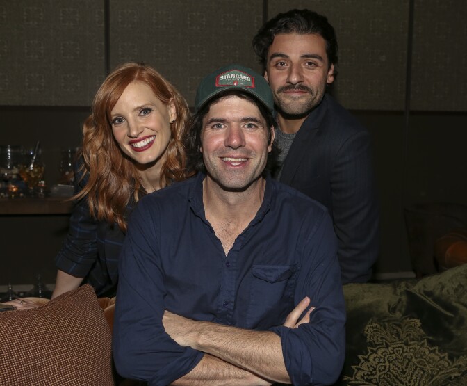 Actress Jessica Chastain (L) Director J.C. Chandor (C) and actor Oscar Isaac (R) attend PANDORA Jewelry Presents "A Most Violent Year" At cinema prive on November 16, 2014 in West Hollywood, California.  
