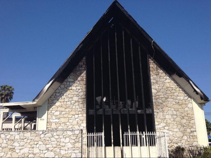 The front of the Bethesda Temple Apostolic church in South Los Angeles after a fire damaged it early Friday morning.