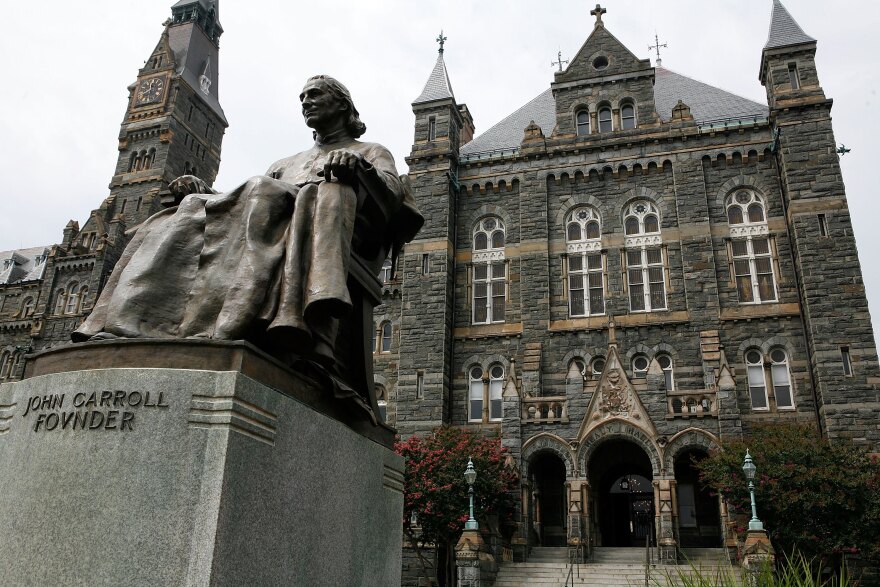 WASHINGTON - AUGUST 15:  A statue of John Carroll, founder of Georgetown University, sits before Healy Hall on the school's campus August 15, 2006 in Washington, DC. Georgetown University was founded in 1789 and it is the oldest Catholic and Jesuit university in the U.S.  (Photo by Alex Wong/Getty Images)