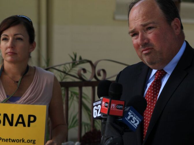 Joelle Casteix (L) and attorney John Manly at news conference announcing lawsuits against Fr. Alex Castillo and the Roman Catholic Diocese of San Bernardino.