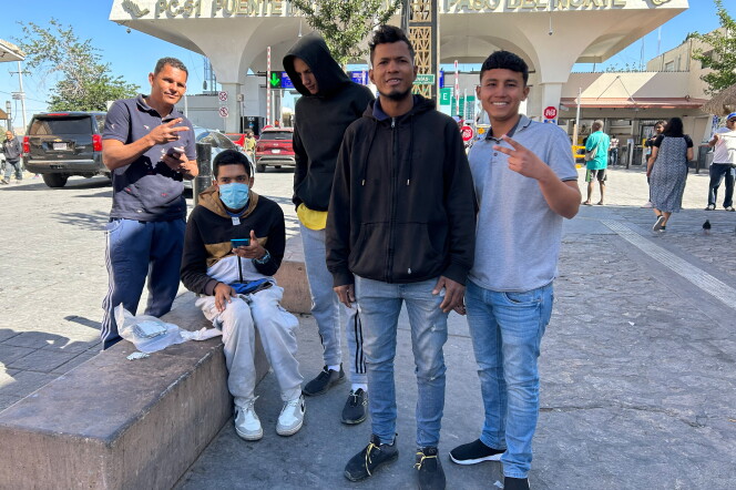 A group of Venezuelan men, including Luis Suárez and Carlos Carrillo Zambrano (pictured in the foreground) at the Paso del Norte International Bridge in Ciudad Juárez, Mexico. They are among many migrants who say that the CBP One app remains riddled with glitches despite a recent update.