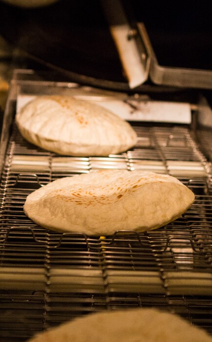 Baking homemade flour tortillas at Joe's Bakery in Austin, Texas.