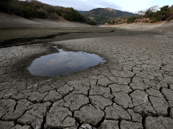  A small pool of water is surrounded by dried and cracked earth that was the bottom of the Almaden Reservoir  on January 28, 2014 in San Jose, California.