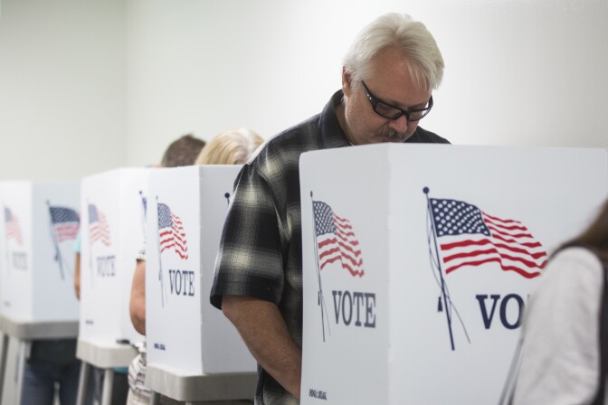 Voters take part in early ballot casting at the Los Angeles County Registrar-Recorder/County Clerk in Norwalk on Wednesday morning, Nov. 2, 2016.