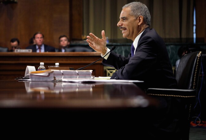 WASHINGTON, DC - JUNE 12:  U.S. Attorney General Eric Holder answers questions while testifying before the Senate Judiciary Committee on Capitol Hill June 12, 2012 in Washington, DC. Holder faced questions from senators about the ongoing Operation Fast and Furious investigation, his decision to ordered two federal prosecutors to begin criminal investigations into a series of national security leaks to the news media and other subjects.  (Photo by Chip Somodevilla/Getty Images)