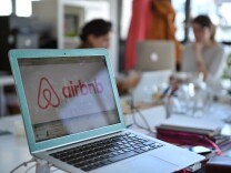 A picture shows the logo of online lodging service Airbnb displayed on a computer screen in the Airbnb offices in Paris on April 21, 2015.