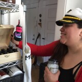 Carmen Morales shows some of the essential oils and herbal remedies she likes to use.