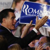 Republican presidential hopeful Mitt Romney greets supporters after addressing a primary night victory rally in Manchester, New Hampshire, January 10, 2012.  