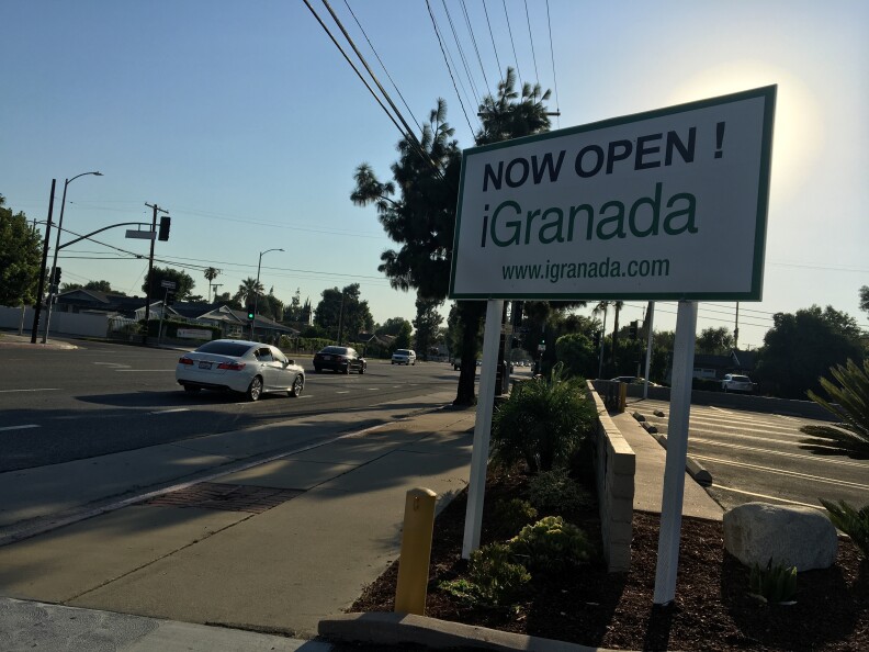 A sign advertising Granada Hills Charter High School's "iGranada" blended learning program near the school's campus on Devonshire Avenue.