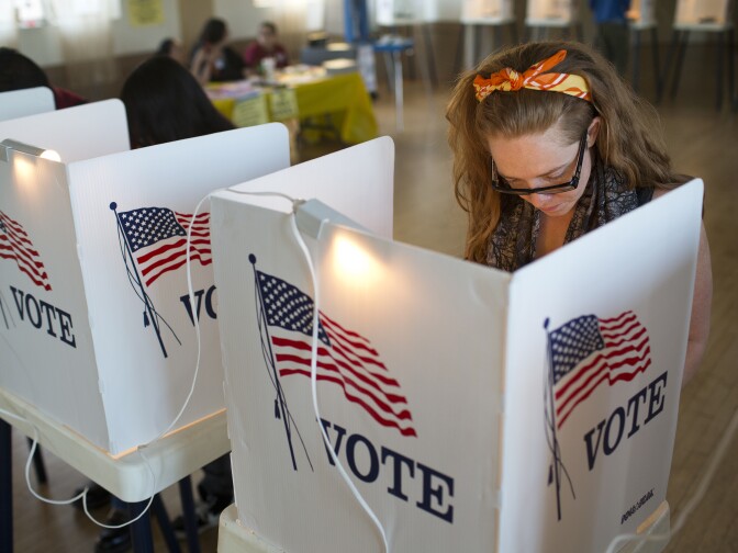 Los Angeles County residents vote inside All Saints Episcopal Church in Highland Park during election day on Tuesday afternoon, Nov. 4, 2014.