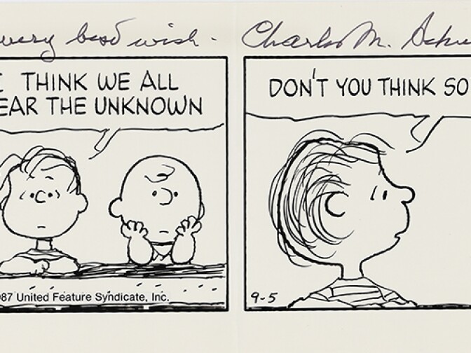 Charles Schulz signed original "Peanuts" daily comic strip featuring Charlie Brown and Linus.