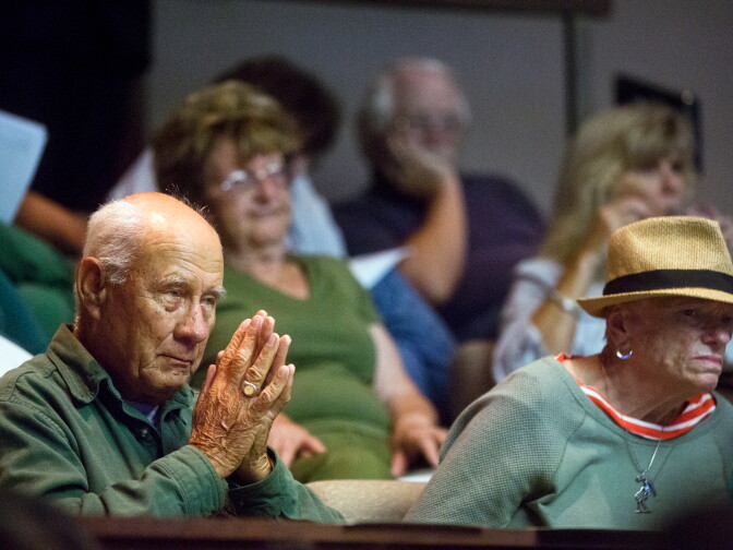 Attendees listen during a city council meeting at Manhattan Beach City Hall on Tuesday night, July 15. The meeting was the first since a shark attack on the Manhattan Beach Pier on July 5.