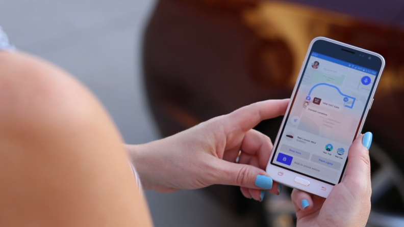 For its Car and Rider Trust study, Intel gave passengers a cell phone loaded with an app to summon a self-driving car.