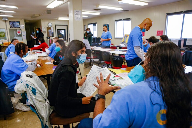 Incarcerated folks in a prison classroom.