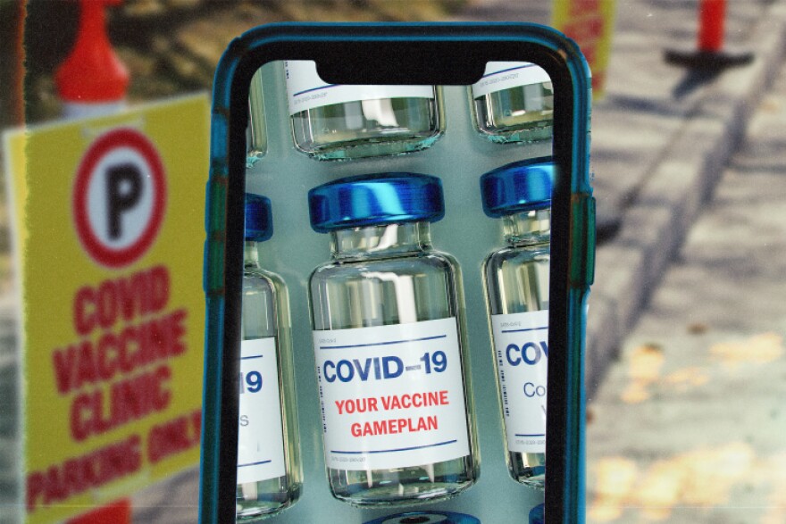 A phone displays vials of COVID-19 vaccines labeled "Your Vaccine Gameplan"