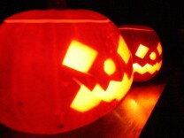 Candle-lit Halloween pumpkins.