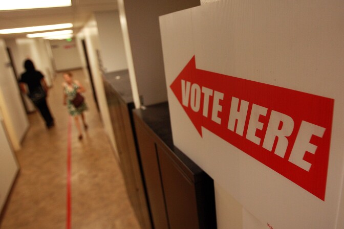 NORWALK, CA - OCTOBER 22:  Voters cast their ballots in early voting at the Los Angeles County Registrar of Voters office on October 22, 2008 in Norwalk, California. With less than two weeks left before the November 4 presidential election, early voting is underway in 31 states including California where Angelenos began casting their votes on October 6.  (Photo by David McNew/Getty Images)