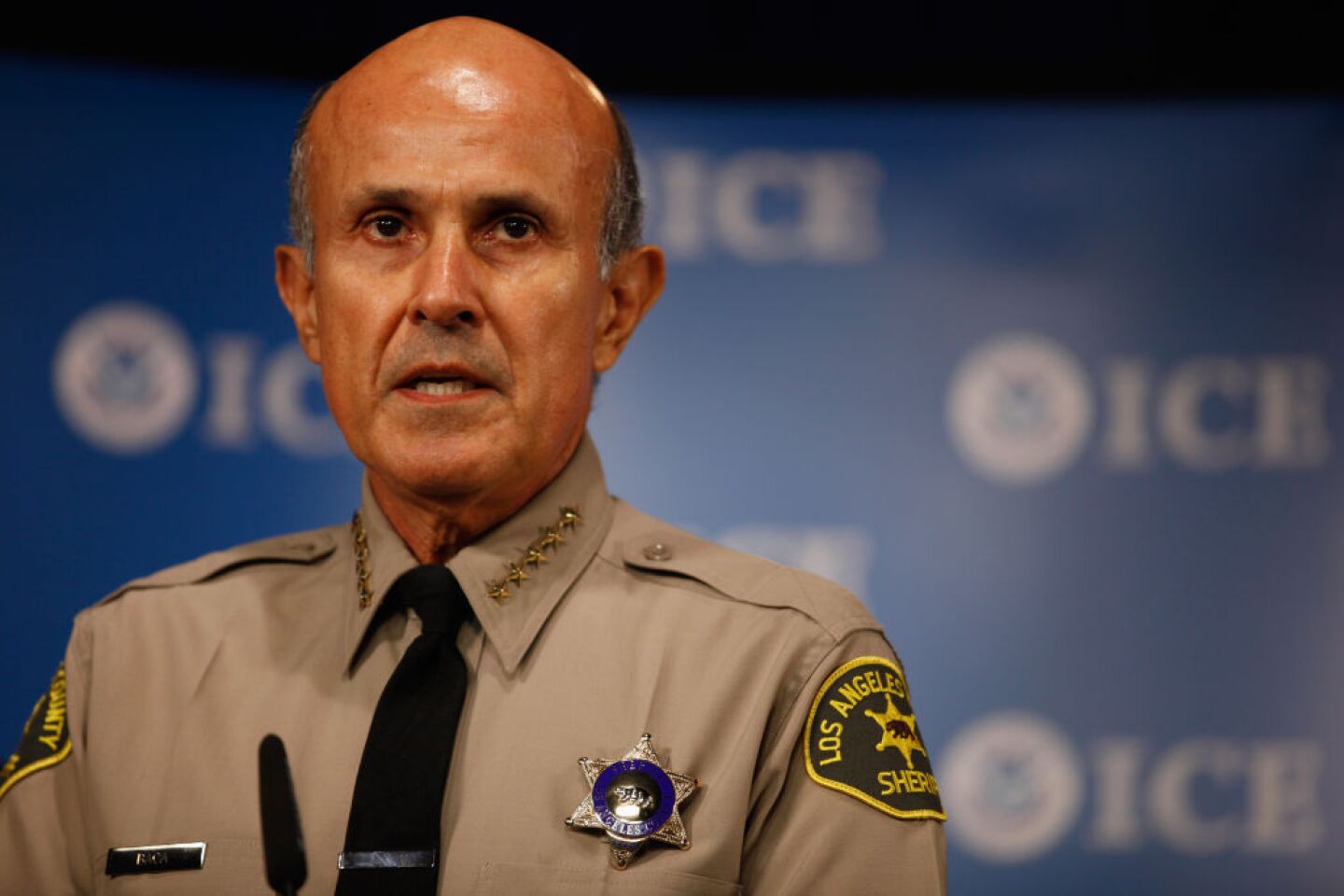 Los Angeles County Sheriff Lee Baca talks about the Department of Homeland Security's Secure Communities program during a news conference at Immigration and Customs Enforcement headquarters Oct. 6, 2010 in Washington, D.C.
