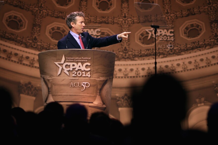 NATIONAL HARBOR, MD - MARCH 07:  Sen. Rand Paul (R-KY) addresses the Conservative Political Action Conference at the Gaylord International Hotel and Conference Center March 7, 2014 in National Harbor, Maryland. The CPAC annual meeting brings together conservative politicians, pundits and their supporters for speeches, panels and classes.  (Photo by Chip Somodevilla/Getty Images)