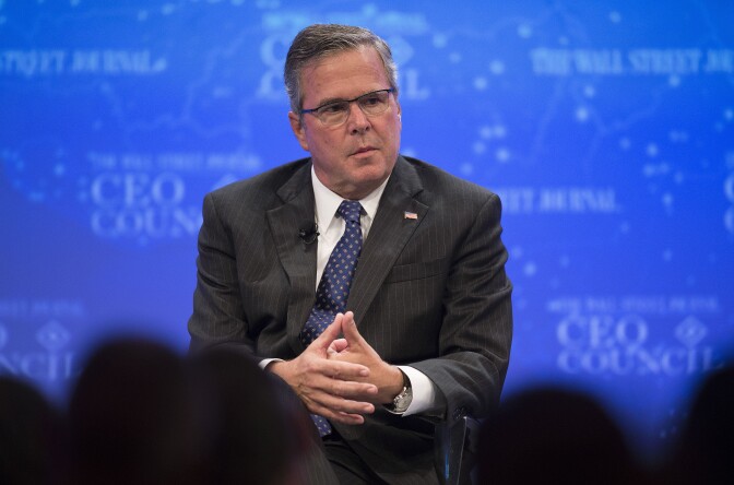 Former Florida Governor Jeb Bush speaks during the Wall Street Journal CEO Council in Washington, DC, December 1, 2014. 