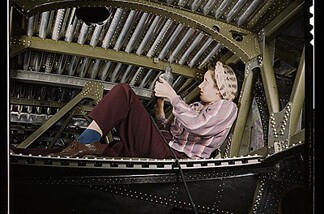 An A-20 bomber being riveted by a woman worker at the Douglas Aircraft Company plant at Long Beach, Calif. This is just one of the color photos recently archived by the Library of Congress from the World War 2 home front.