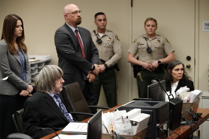 RIVERSIDE, CA - JANUARY 24: Louise Anna Turpin and David Allen Turpin, accused of abusing and holding 13 of their children captive, appear in court on January 24, 2018 in Riverside, California. According to Riverside County Sheriffs, David Allen Turpin and Louise Anna Turpin held 13 malnourished children ranging in age from 2 to 29 captive in their Perris, California home. Deputies were alerted after a 17-year-old daughter escaped by jumping through a window shortly before dawn, carrying a de-activated mobile phone from which she was able to call 911 for help. Responding deputies described conditions in the home as foul-smelling with some kids chained to a bed and suffering injuries as a result. Adult children appeared at first to be minors because of their malnourished state. The Turpins were arrested on charges of torture and child endangerment.  (Photo by Gina Ferazzi - Pool/Getty Images)
