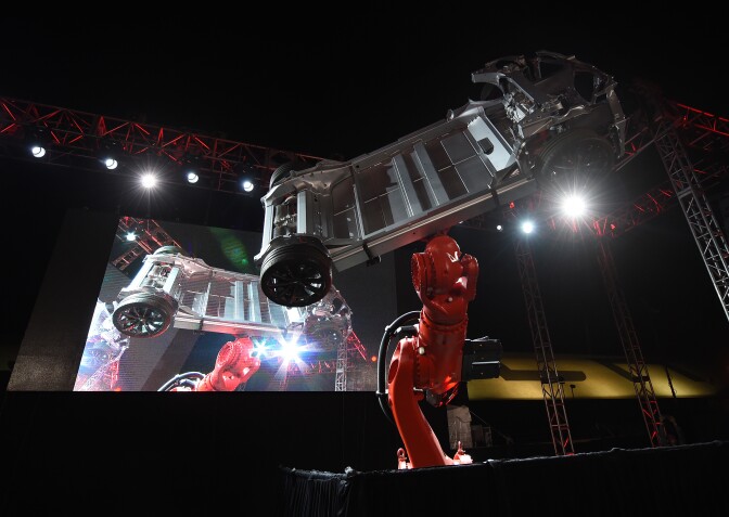 A robotic arm in display on a stage