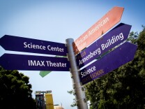 Signs point to the various attractions at Exposition Park, all of which are accessible by the Metro Expo Line.