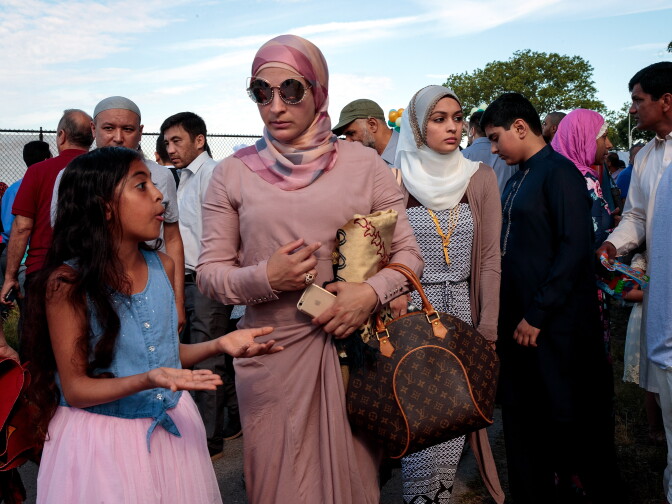 NEW YORK, NY - JUNE 25:  Muslim worshippers depart a group prayer service during Eid al-Fitr, which marks the end of the Muslim holy month of Ramadan, in Bensonhurst Park in the Brooklyn borough June 25, 2017 in New York City. Muslims around the world are celebrating Eid al-Fitr, which means 'festival of breaking the fast' to mark the end of Ramadan. (Photo by Drew Angerer/Getty Images)
