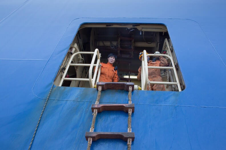 Members of the Hyundai Faith from Korea wait for Port Pilot Brett McDaniel to board their ship.
