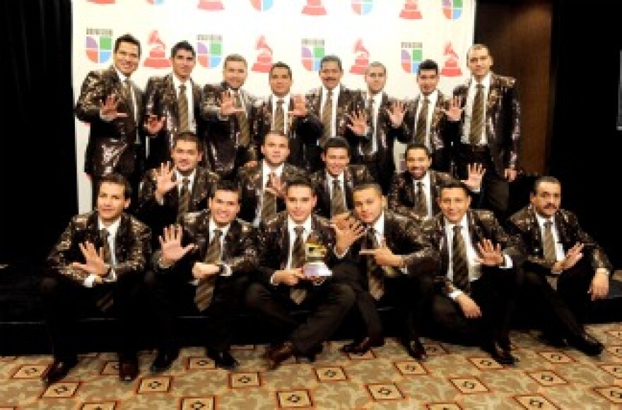 Musical group Banda El Recodo pose in the press room during the 11th annual Latin Grammy Awards in 2010.