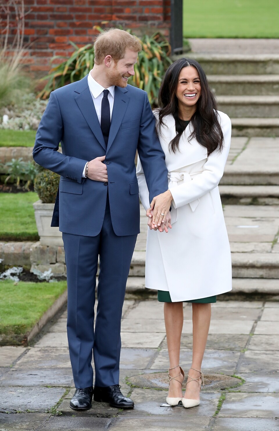 LONDON, ENGLAND - NOVEMBER 27:  Prince Harry and actress Meghan Markle during an official photocall to announce their engagement at The Sunken Gardens at Kensington Palace on November 27, 2017 in London, England.  Prince Harry and Meghan Markle have been a couple officially since November 2016 and are due to marry in Spring 2018.  (Photo by Chris Jackson/Chris Jackson/Getty Images)