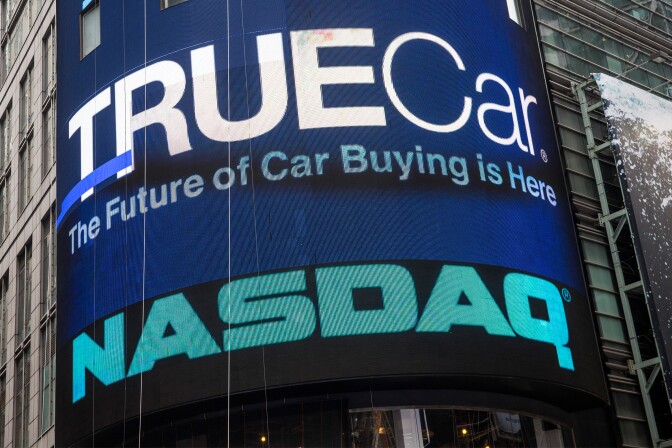 NEW YORK, NY - MAY 16:  TrueCar's logo is displayed on the Nasdaq billboard in Times Square on May 16, 2014 in New York City. TrueCar is having it's initial public offering (IPO) today on the Nasdaq exchange.  (Photo by Andrew Burton/Getty Images)