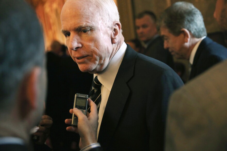 U.S. Sen. John McCain (R-AZ) speaks to members of the media as he arrives for the weekly Senate Republican Policy Committee luncheon September 24, 2013 on Capitol Hill in Washington, DC. Senate Republicans held the luncheon to discuss Senate Republican agendas. 