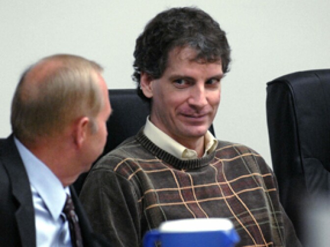 File photo: Joseph Edward Duncan III (R), listens to his Public Defender John Adams (L), during a plea agreement and sentencing hearing in the court room of the Kootenai County Jail 16 October, 2006 in Coeur d' Alene, Idaho.